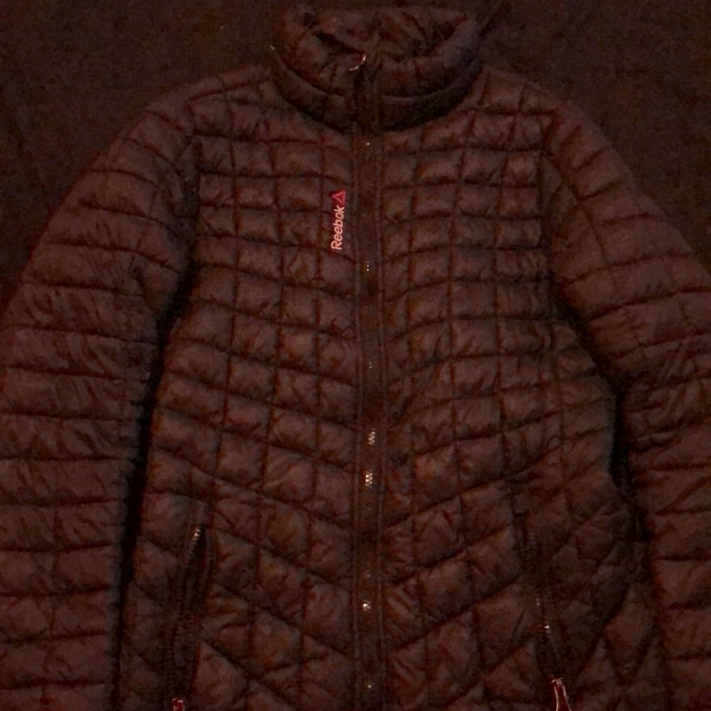 A Reebok pink on the in dive black on the outside coat